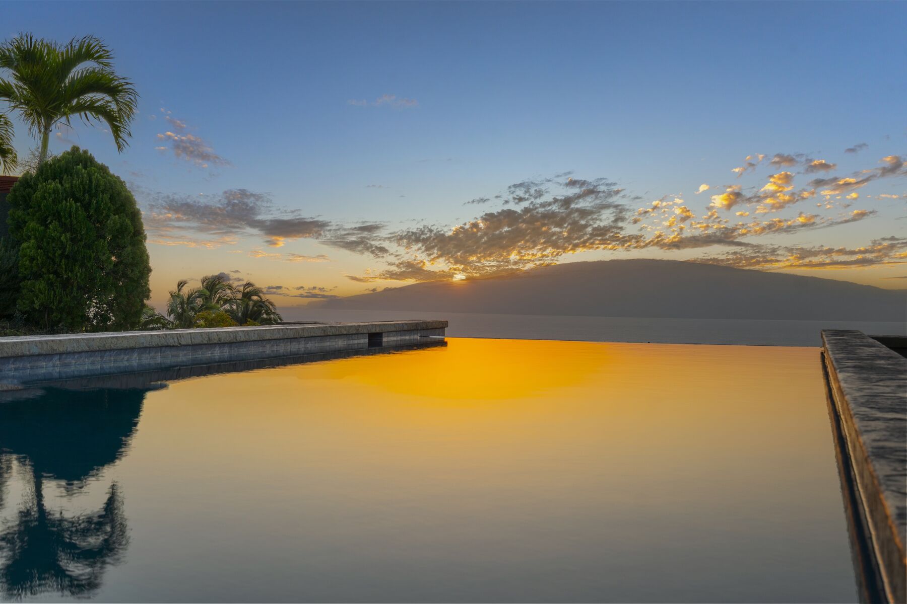 Infinity edge at sunset toward Lanai